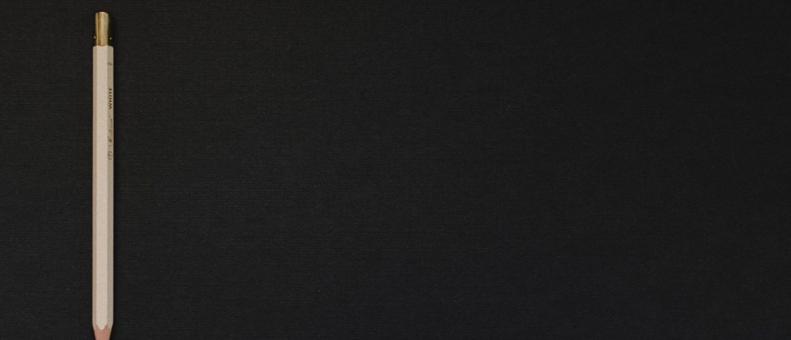 pencil on black background
